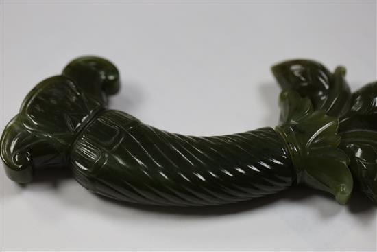 A Mughal spinach jade dagger handle, 5.75in.